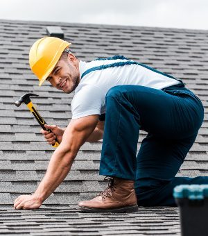 selective-focus-of-handsome-handyman-repairing-roo-5HJCQU9-2-qavgaypjy2zhpo96525nydk8j14vpg7ff634cr71vs